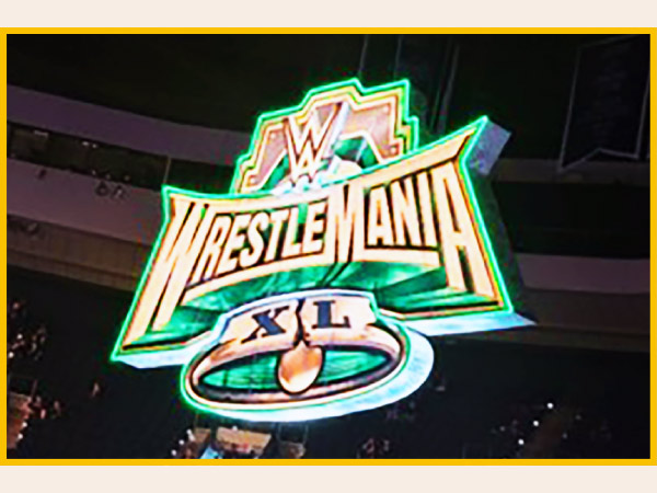 Giant wrestling event sign