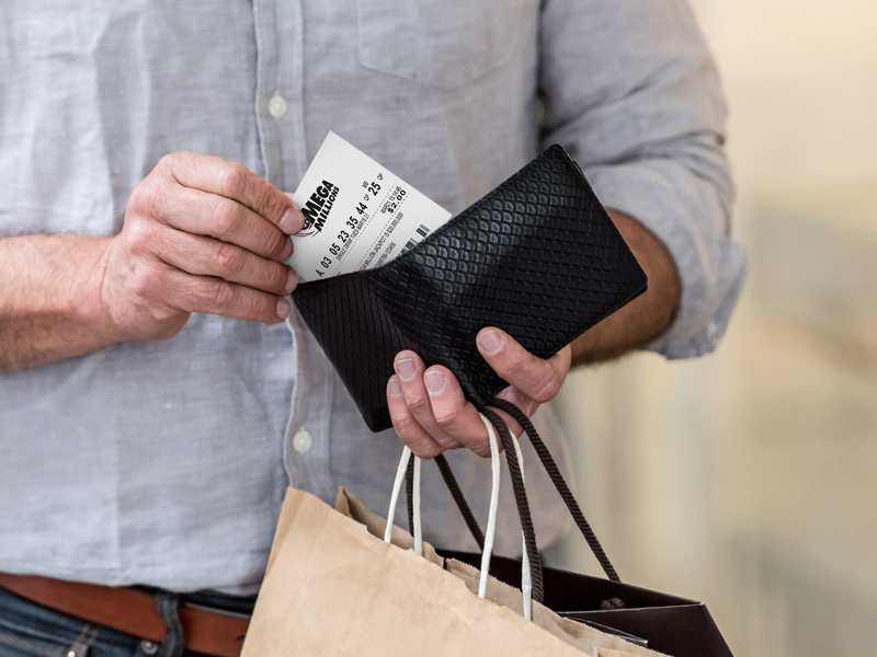 Putting a lottery ticket in wallet